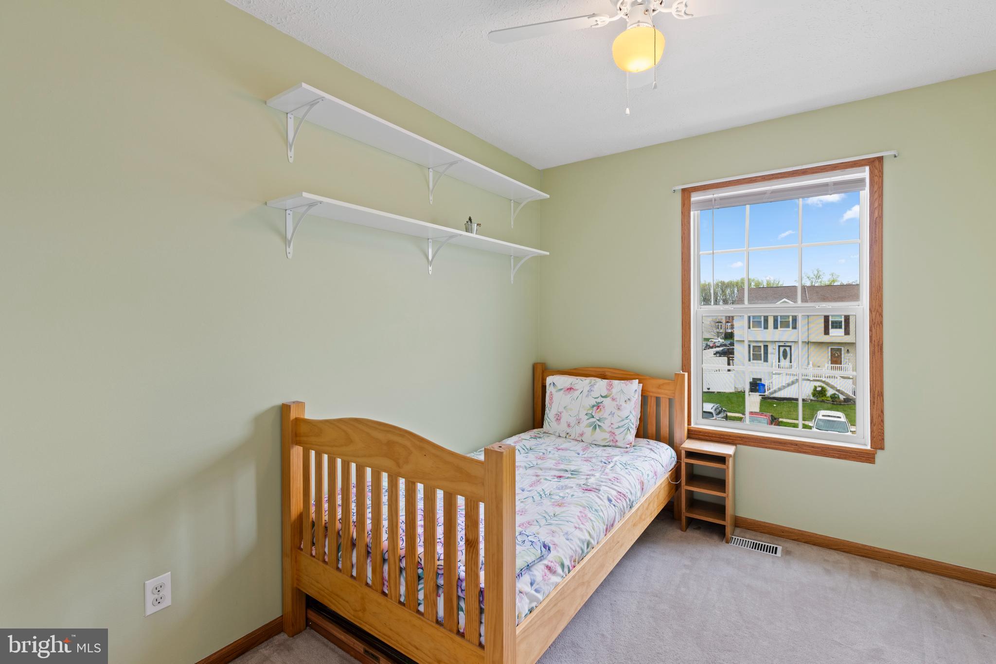 3916 Hunt Harbor Road Baltimore, MD 21220 - Photo 13 of 30 a bedroom with a bed and window