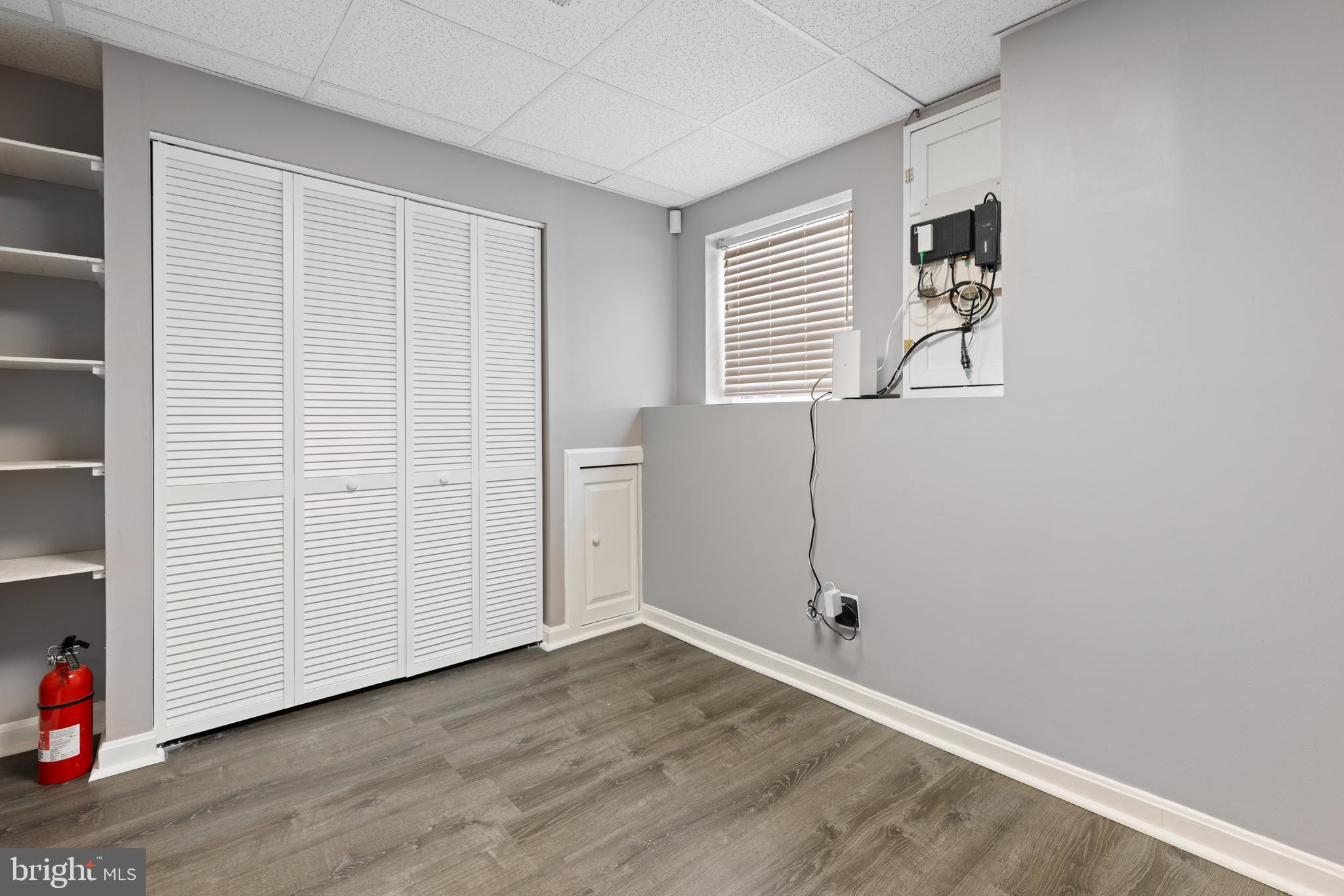 3916 Hunt Harbor Road Baltimore, MD 21220 - Photo 21 of 30 an empty room with wooden floor and closet