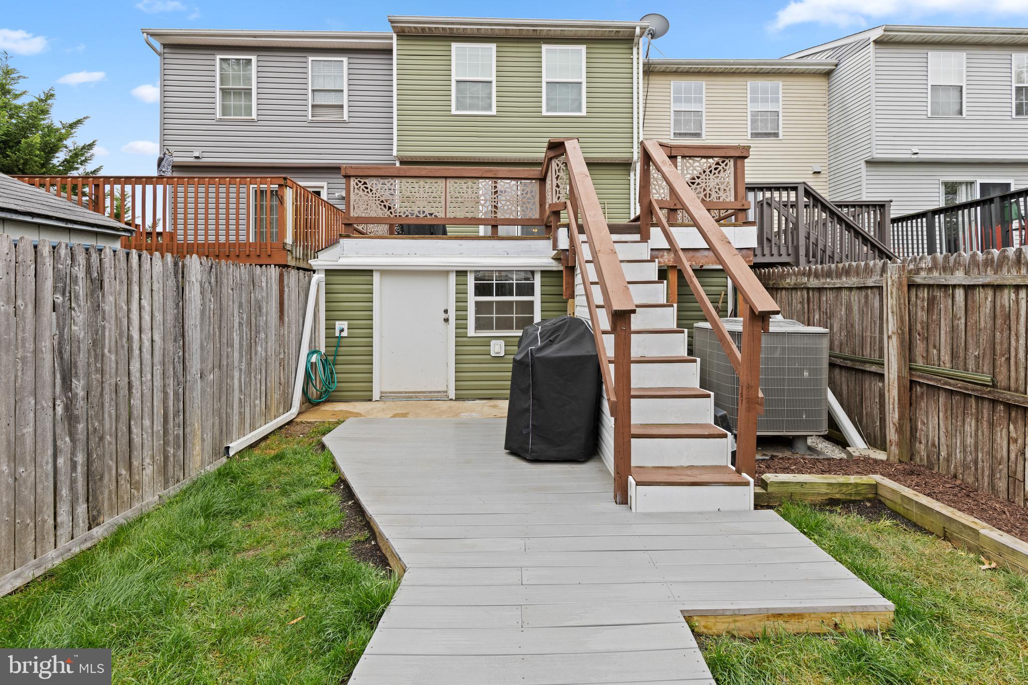 3916 Hunt Harbor Road Baltimore, MD 21220 - Photo 25 of 30 a view of a house with backyard and deck