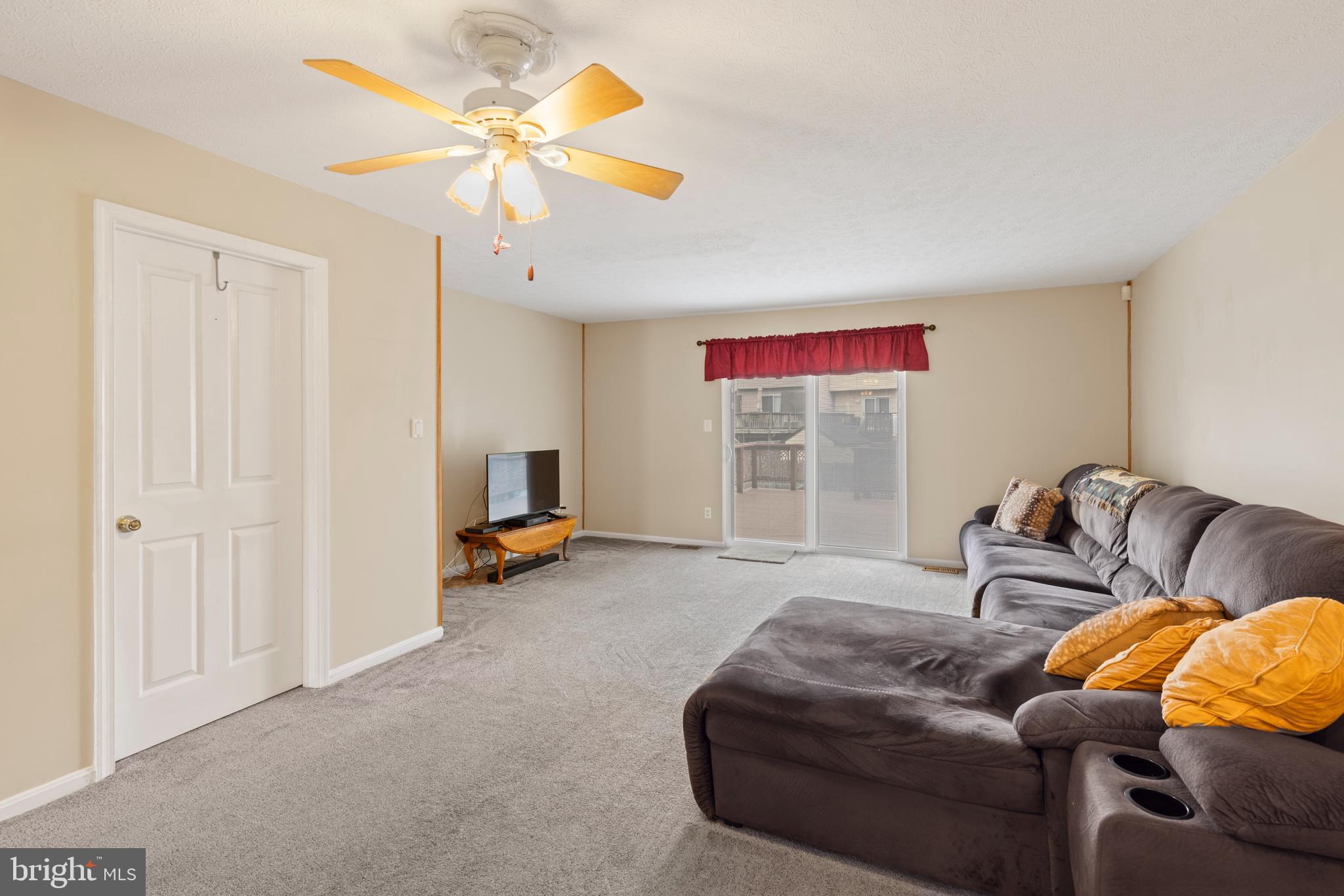 3916 Hunt Harbor Road Baltimore, MD 21220 - Photo 4 of 30 a bedroom with furniture and a ceiling fan