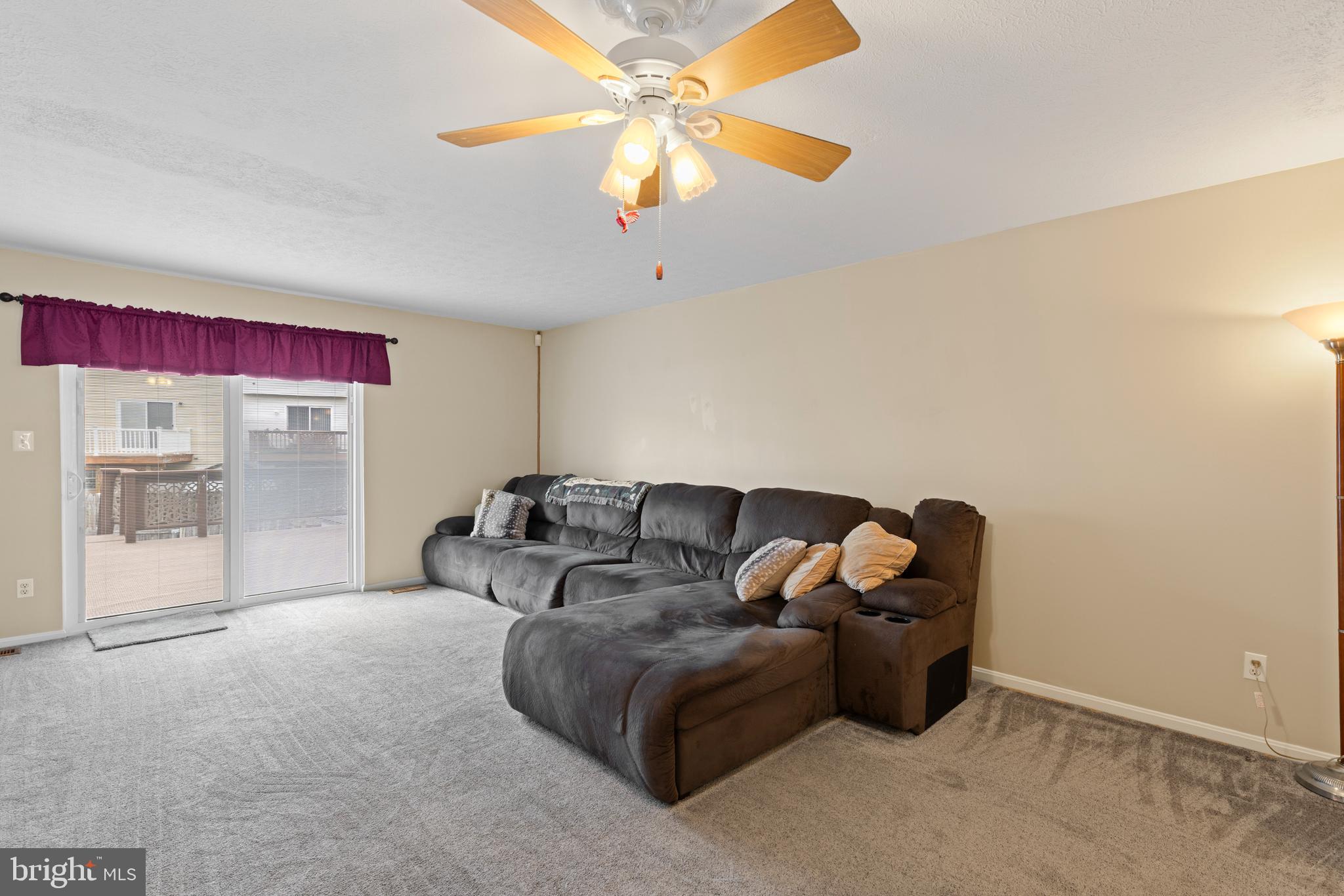 3916 Hunt Harbor Road Baltimore, MD 21220 - Photo 5 of 30 a living room with furniture and a chandelier