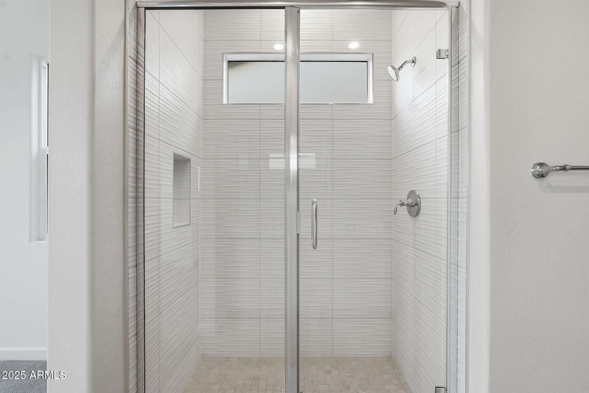 17927 West Long Lake Road Goodyear, AZ 85338 - Photo 15 of 36 a bathroom with a shower