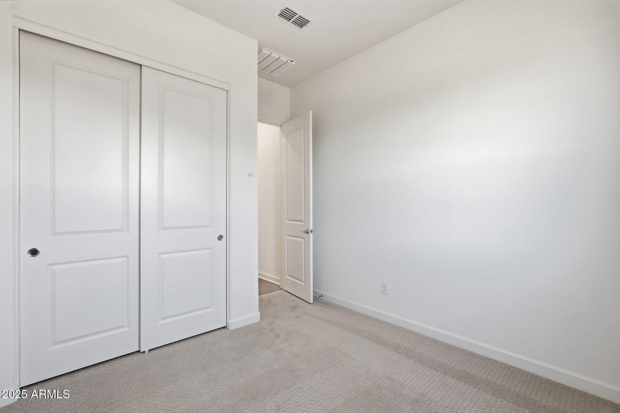 17927 West Long Lake Road Goodyear, AZ 85338 - Photo 18 of 36 a view of an empty room
