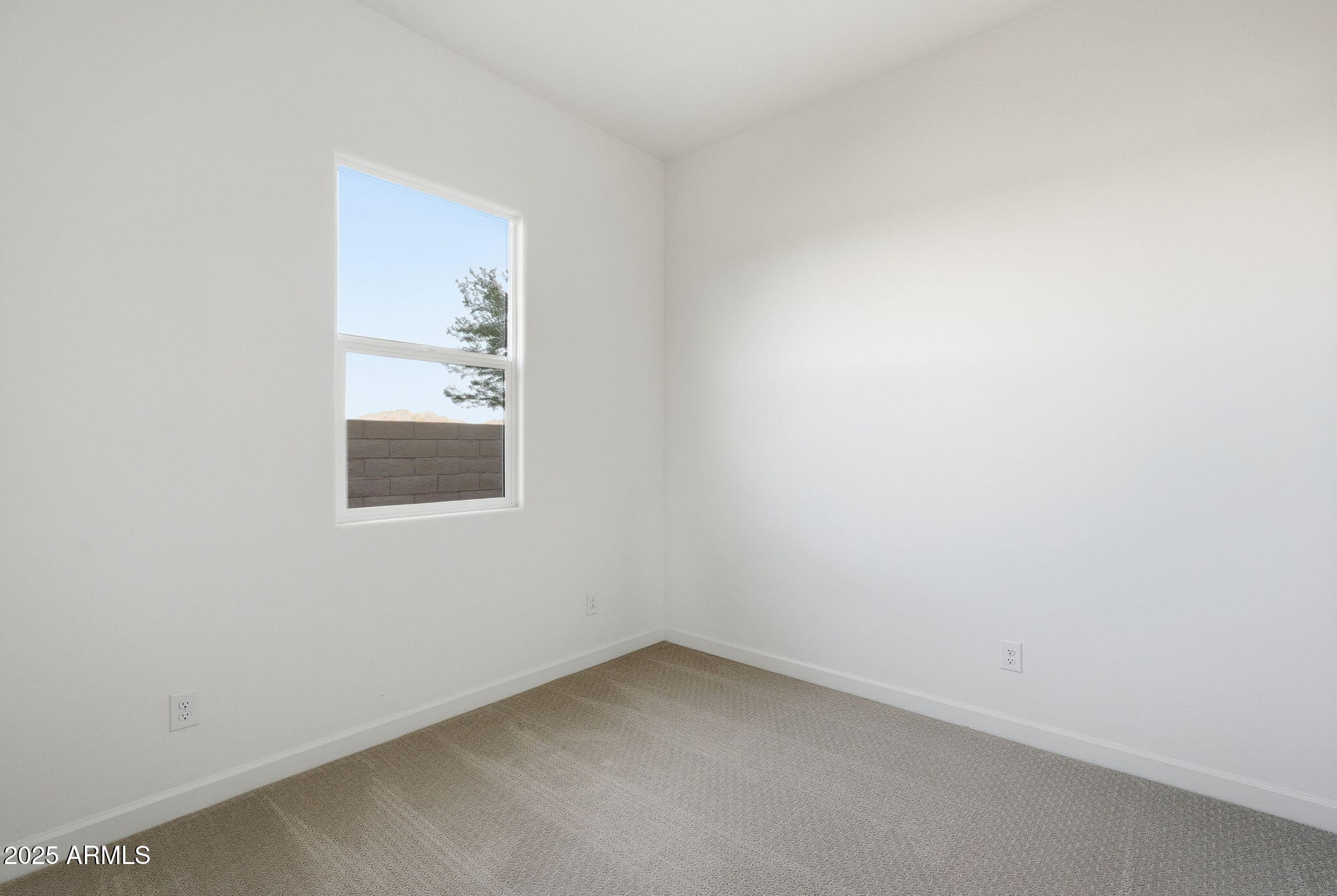 17927 West Long Lake Road Goodyear, AZ 85338 - Photo 19 of 36 a view of an empty room