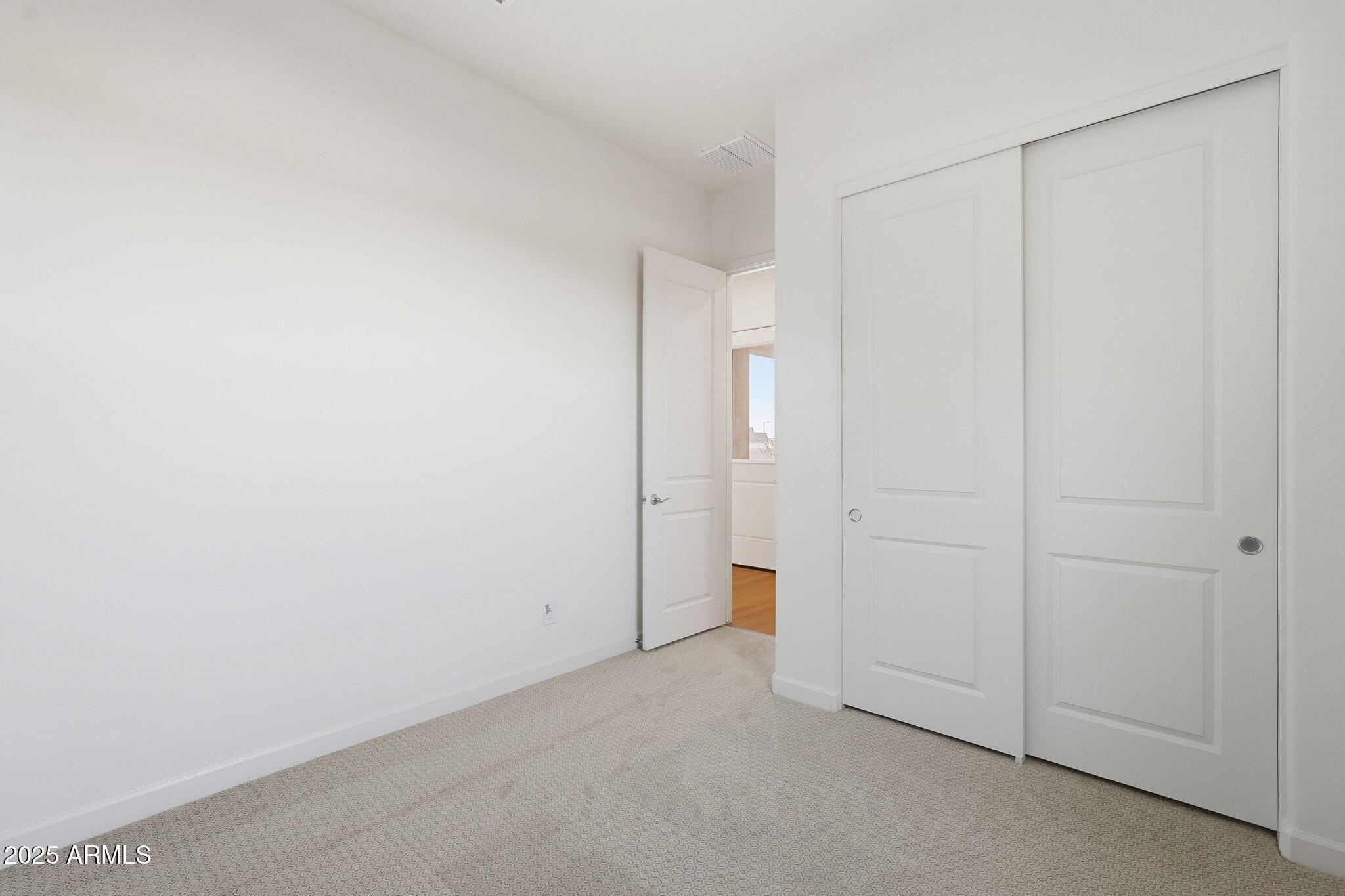 17927 West Long Lake Road Goodyear, AZ 85338 - Photo 20 of 36 a view of an empty room