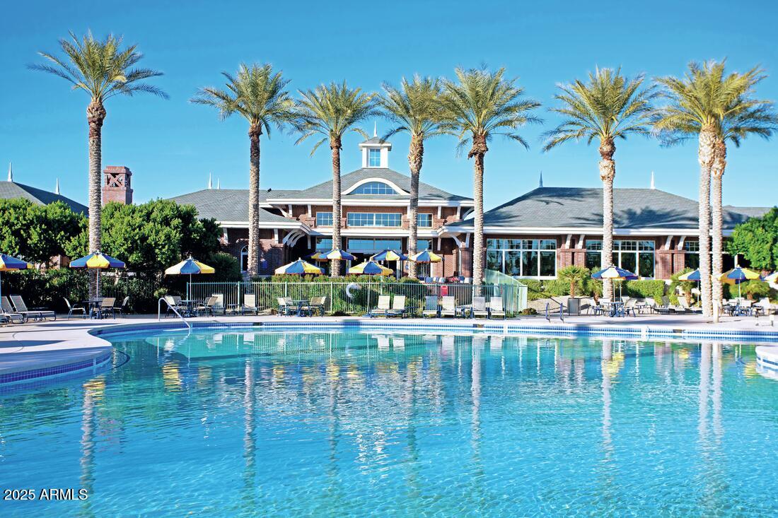17927 West Long Lake Road Goodyear, AZ 85338 - Photo 31 of 36 a front view of a house with swimming pool having outdoor seating