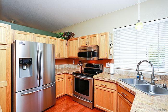 9750 Saybrook Street Highlands Ranch, CO 80126 - Photo 8 of 25 Gallery Image 8