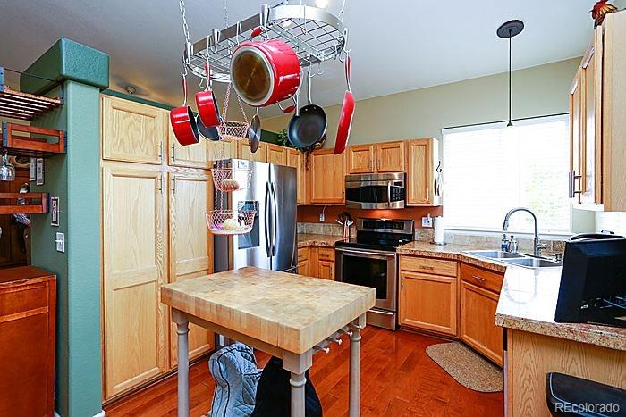 9750 Saybrook Street Highlands Ranch, CO 80126 - Photo 9 of 25 Gallery Image 9