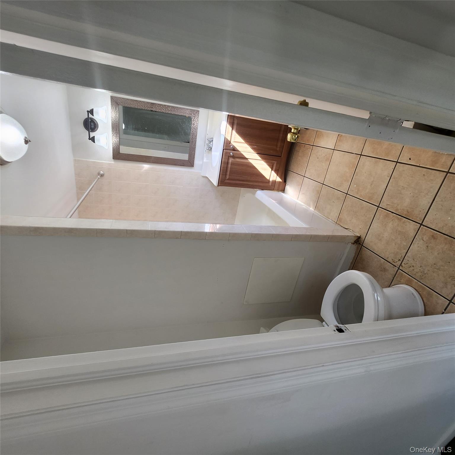 5 Morton Street Poughkeepsie, NY 12601 - Photo 16 of 23 a bathroom with a toilet and a sink