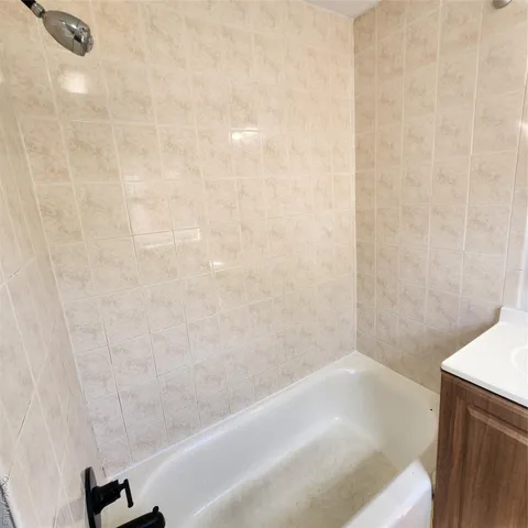 a bathroom with a bathtub