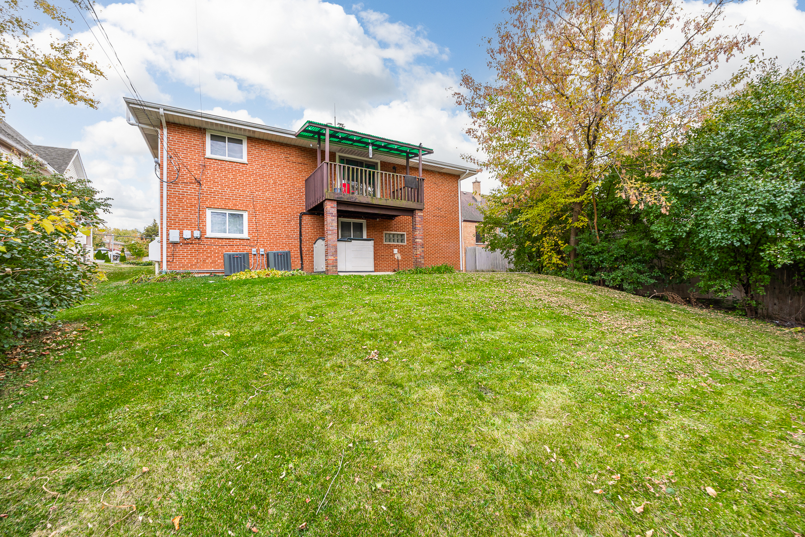 332 Maple Avenue, Unit 1 Downers Grove, IL 60515 - Photo 25 of 29 a front view of a house with a yard