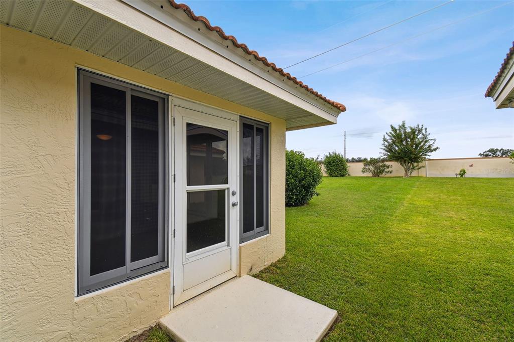 142 Morning Glory Circle Winter Haven, FL 33884 - Photo 28 of 36 a view front of house with backyard