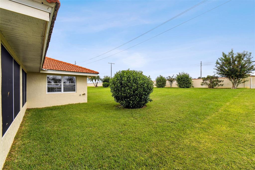 142 Morning Glory Circle Winter Haven, FL 33884 - Photo 30 of 36 a view of a house with backyard