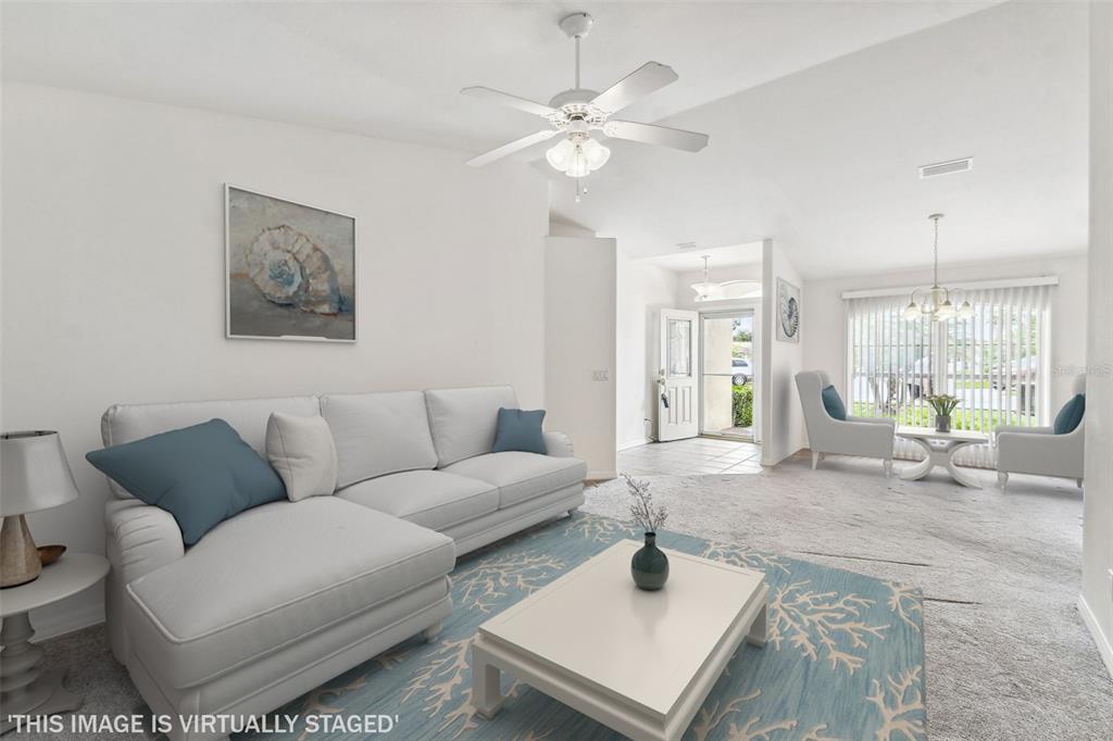 142 Morning Glory Circle Winter Haven, FL 33884 - Photo 3 of 36 a living room with furniture and a large window