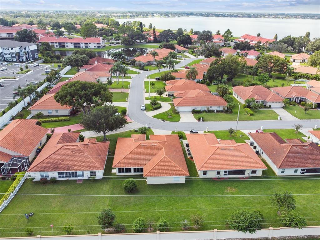 142 Morning Glory Circle Winter Haven, FL 33884 - Photo 8 of 36 an aerial view of residential houses with outdoor space