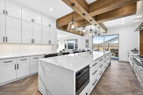 a living room with fireplace furniture and a flat screen tv