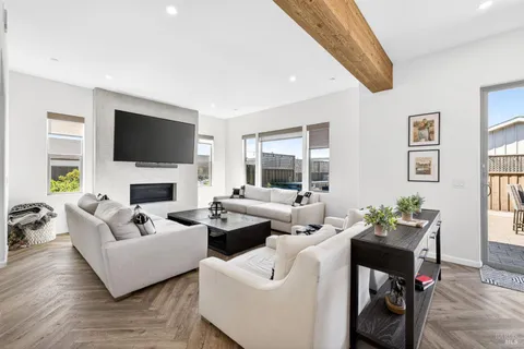 a bedroom with a bed lamp and window