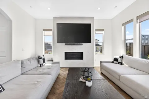 a bathroom with double vanity and a shower