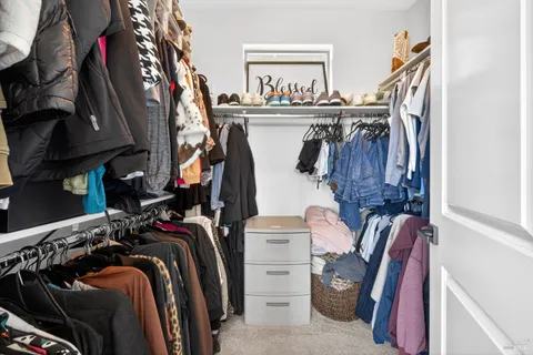 a view of a backyard with sitting area