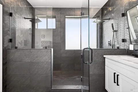 an aerial view of a house with swimming pool