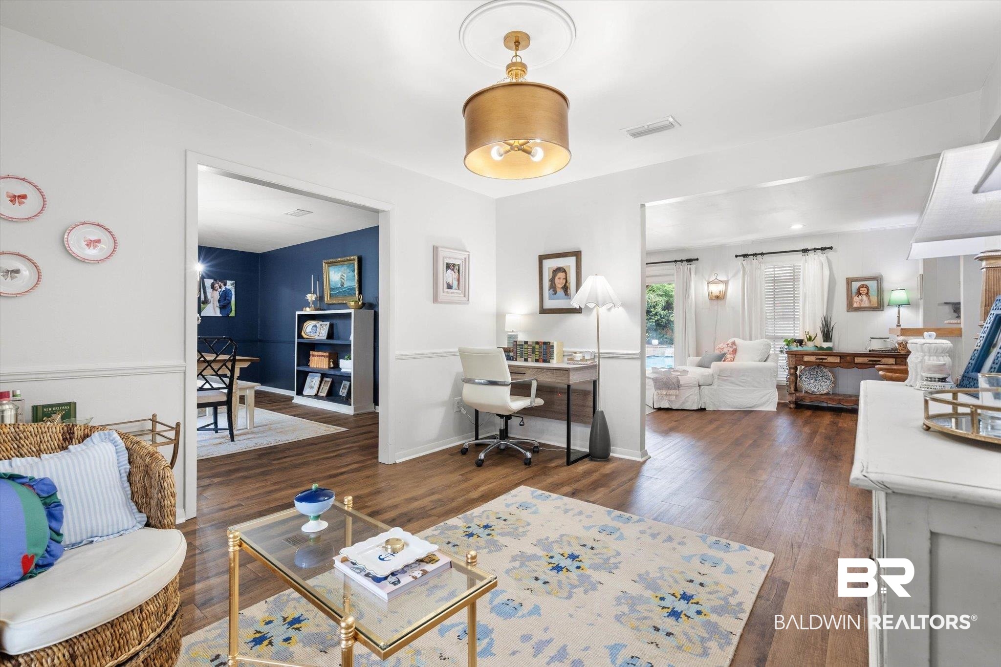 254 Woodlands Avenue Mobile, AL 36607 - Photo 13 of 50 Living room featuring a desk and dark wood finished floors