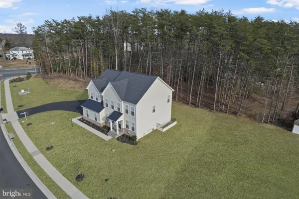 a view of a tiny house with a yard