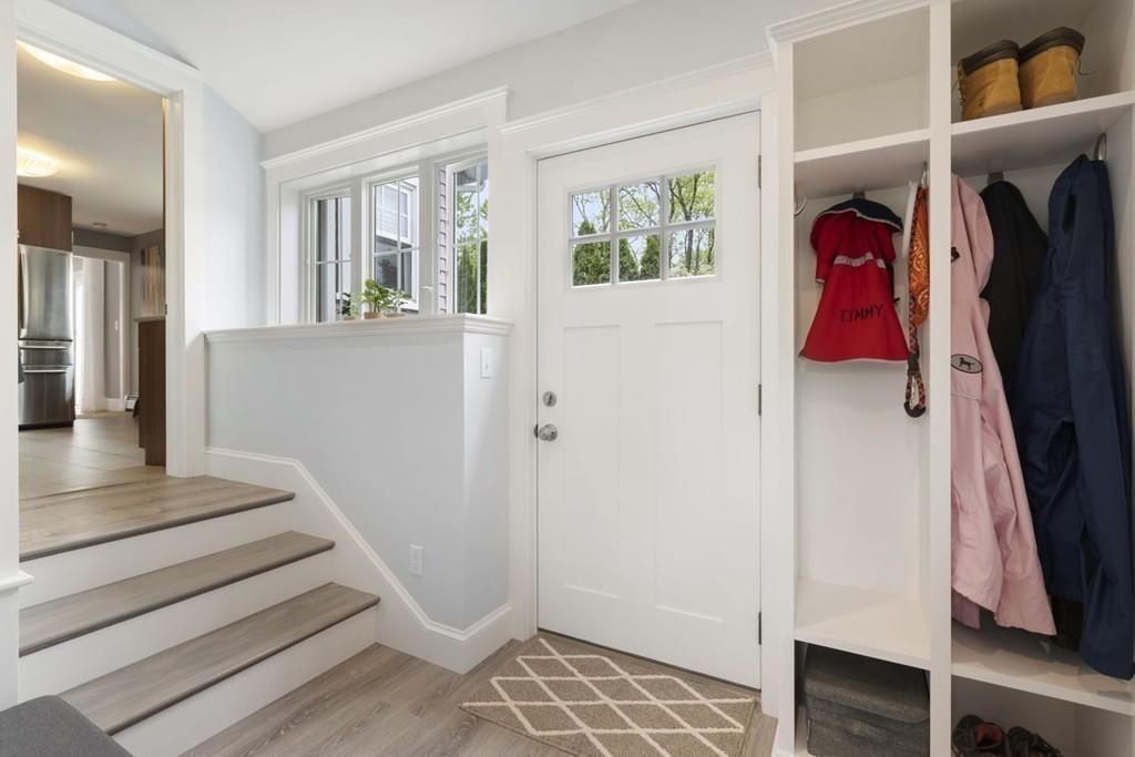 4 Bryn Mawr Road Wellesley, MA 02482 - Photo 17 of 27 a view of walk in closet with clothes and shoes