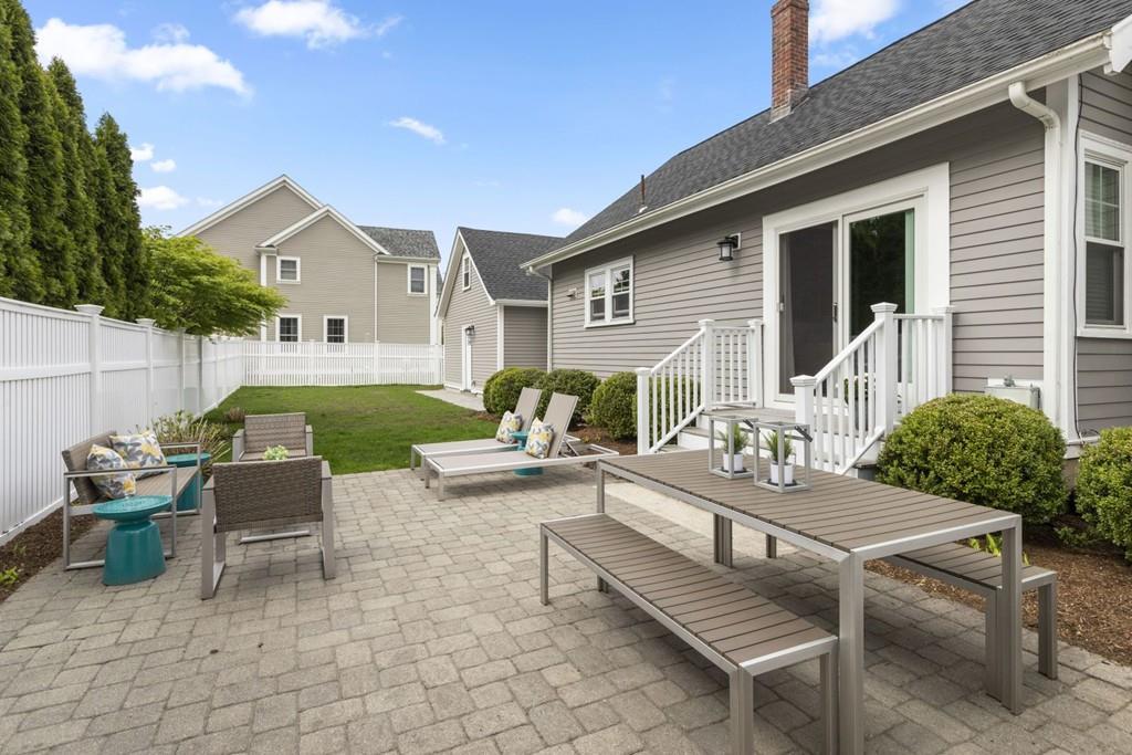 4 Bryn Mawr Road Wellesley, MA 02482 - Photo 20 of 27 a view of a house with backyard and sitting area