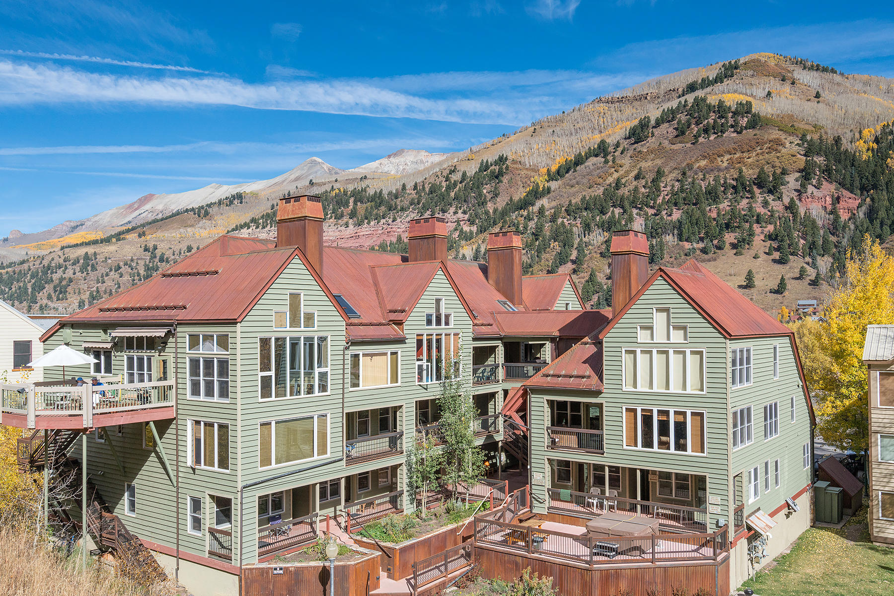 800 Black Bear Road, Unit 11 Telluride, CO 81435 - Photo 11 of 11 a view of a large building with a yard