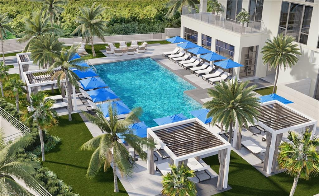 6869 Grenadier Boulevard, Unit 402 Naples, FL 34108 - Photo 2 of 12 View of swimming pool with a pergola and a patio area