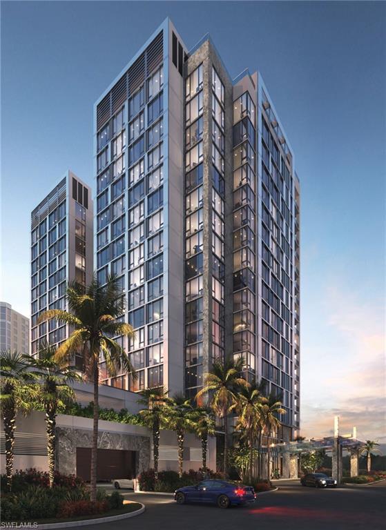 6869 Grenadier Boulevard, Unit 402 Naples, FL 34108 - Photo 3 of 12 View of outdoor building at dusk