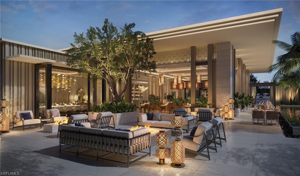 6869 Grenadier Boulevard, Unit 402 Naples, FL 34108 - Photo 6 of 12 Out door loung / firepit area