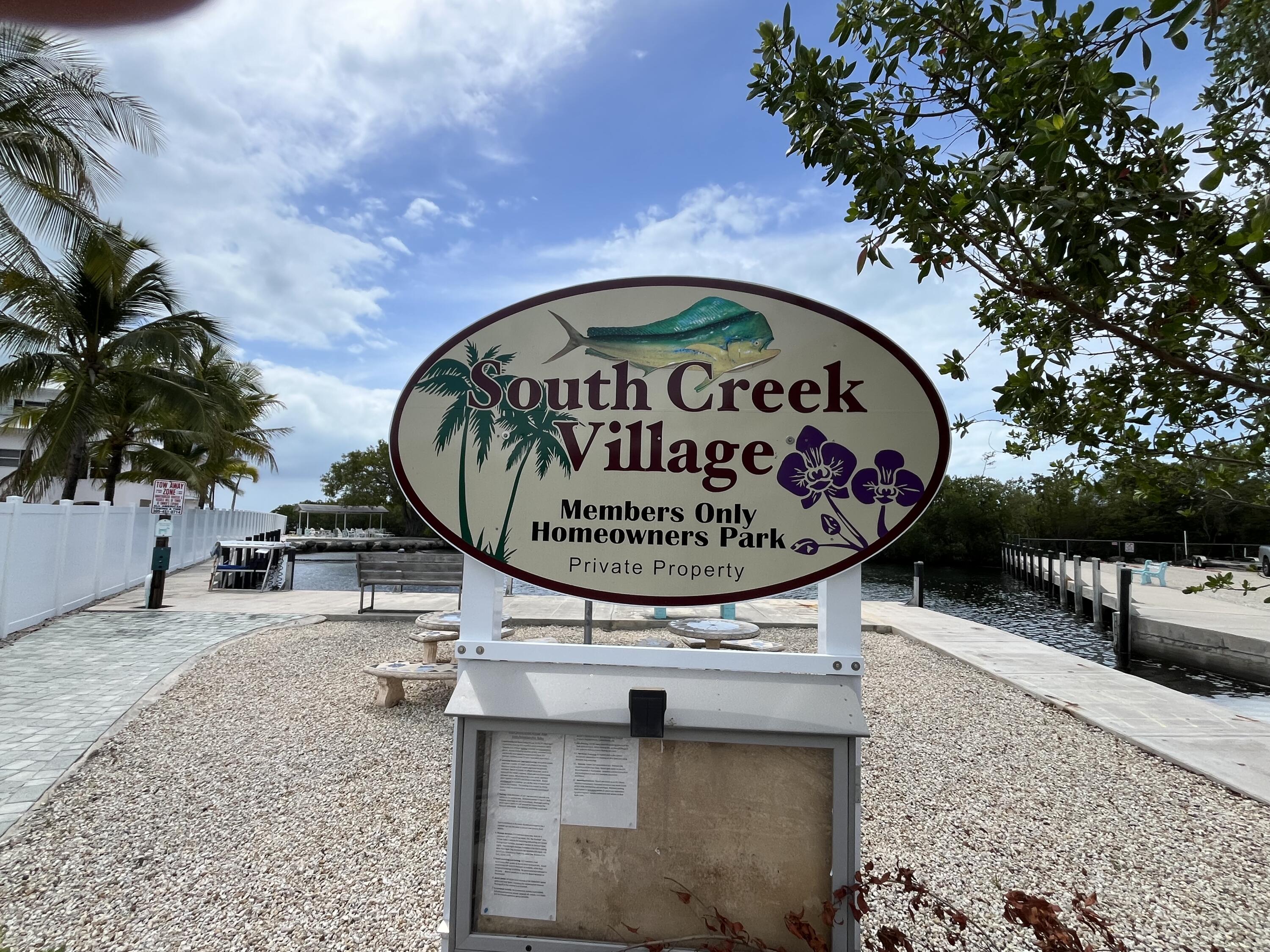 639 Cabrera Street Key Largo, FL 33037 - Photo 6 of 24 a view of a bench in a patio