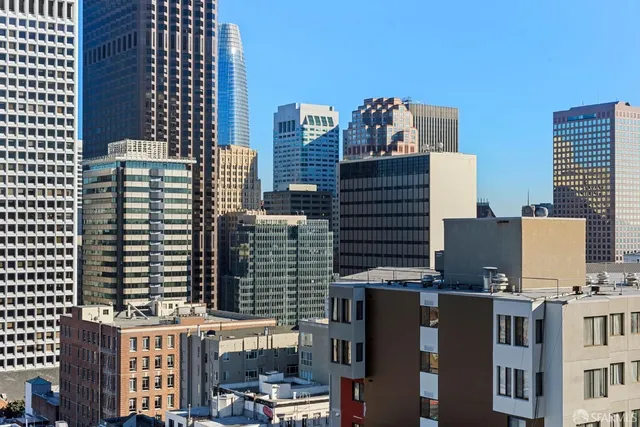 a view of a city with tall buildings