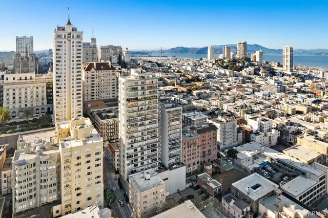 a view of a city with tall buildings