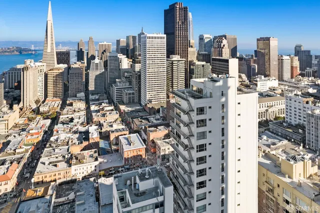 a view of city with tall buildings