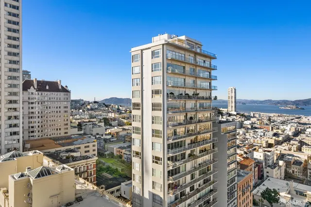 a view of a city with tall buildings