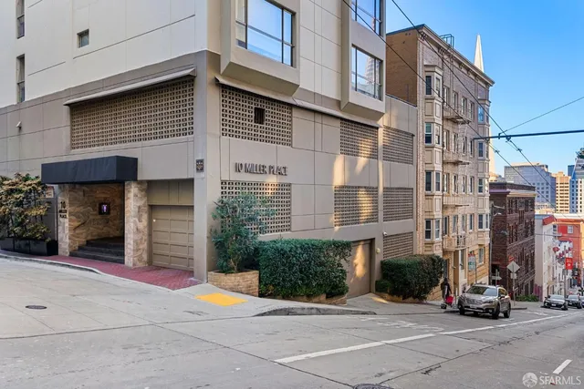 a view of a street with buildings