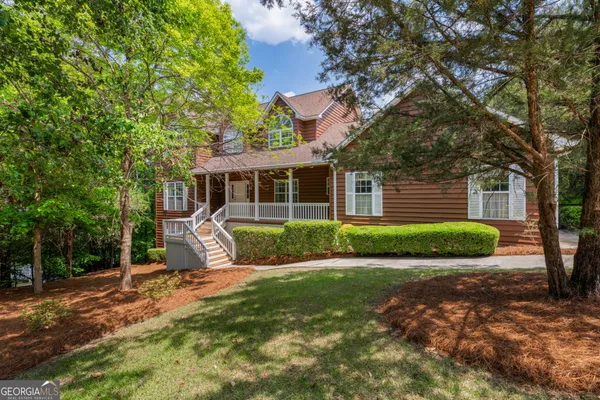 front view of a house with a yard