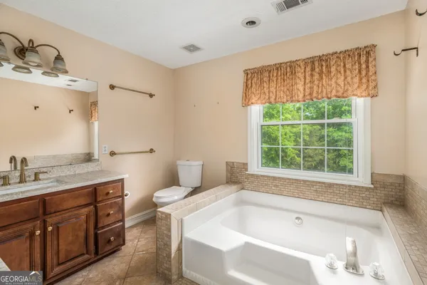 a bathroom with a sink and a bathtub