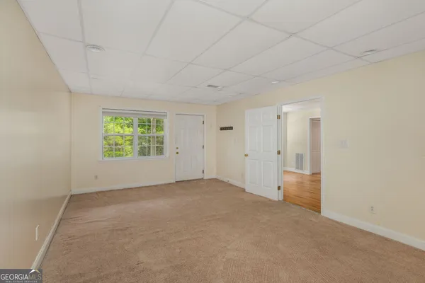 an empty room with windows
