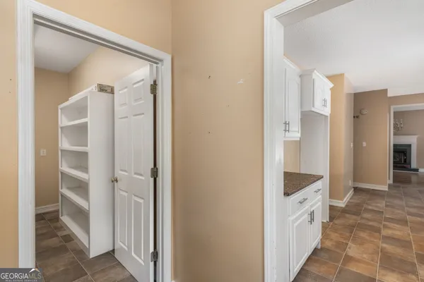 a bathroom with a double vanity sink and mirror
