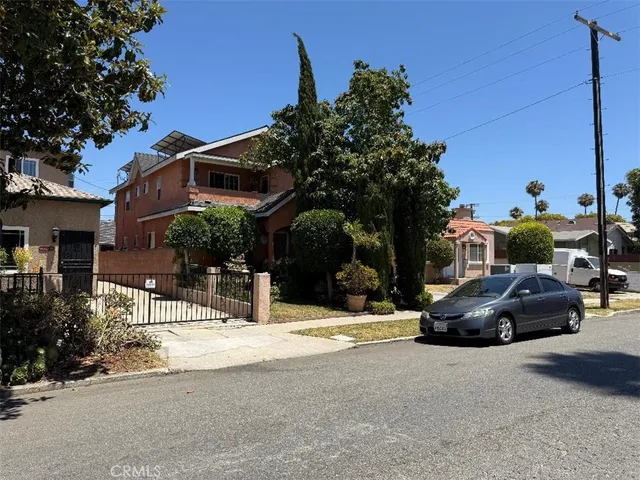 a view of car parked in front of building