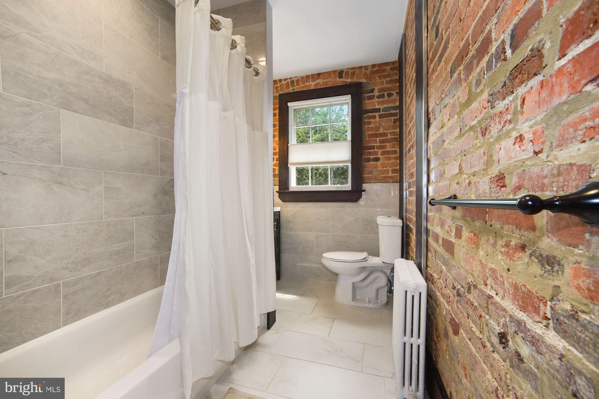 1125 Columbia Road Northwest Washington, DC 20009 - Photo 18 of 47 Owner Suite Bathroom