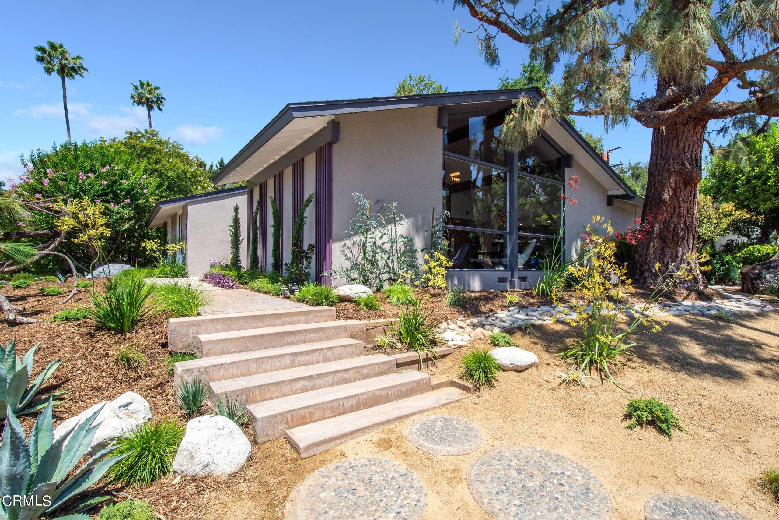 215 Highlawn Place Altadena, CA 91001 - Photo 1 of 38 a front view of a house with a yard