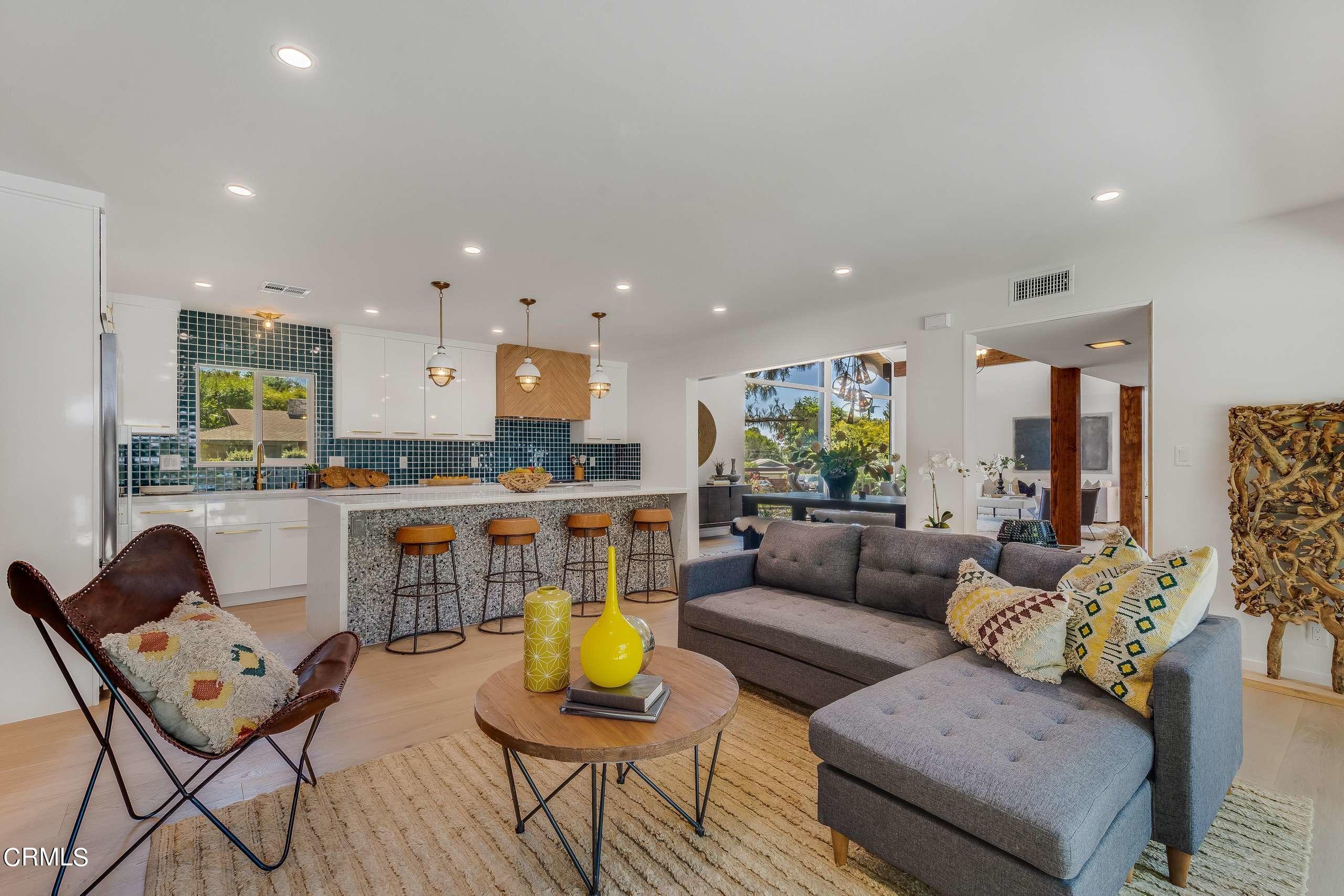 215 Highlawn Place Altadena, CA 91001 - Photo 11 of 38 a living room with furniture and kitchen view