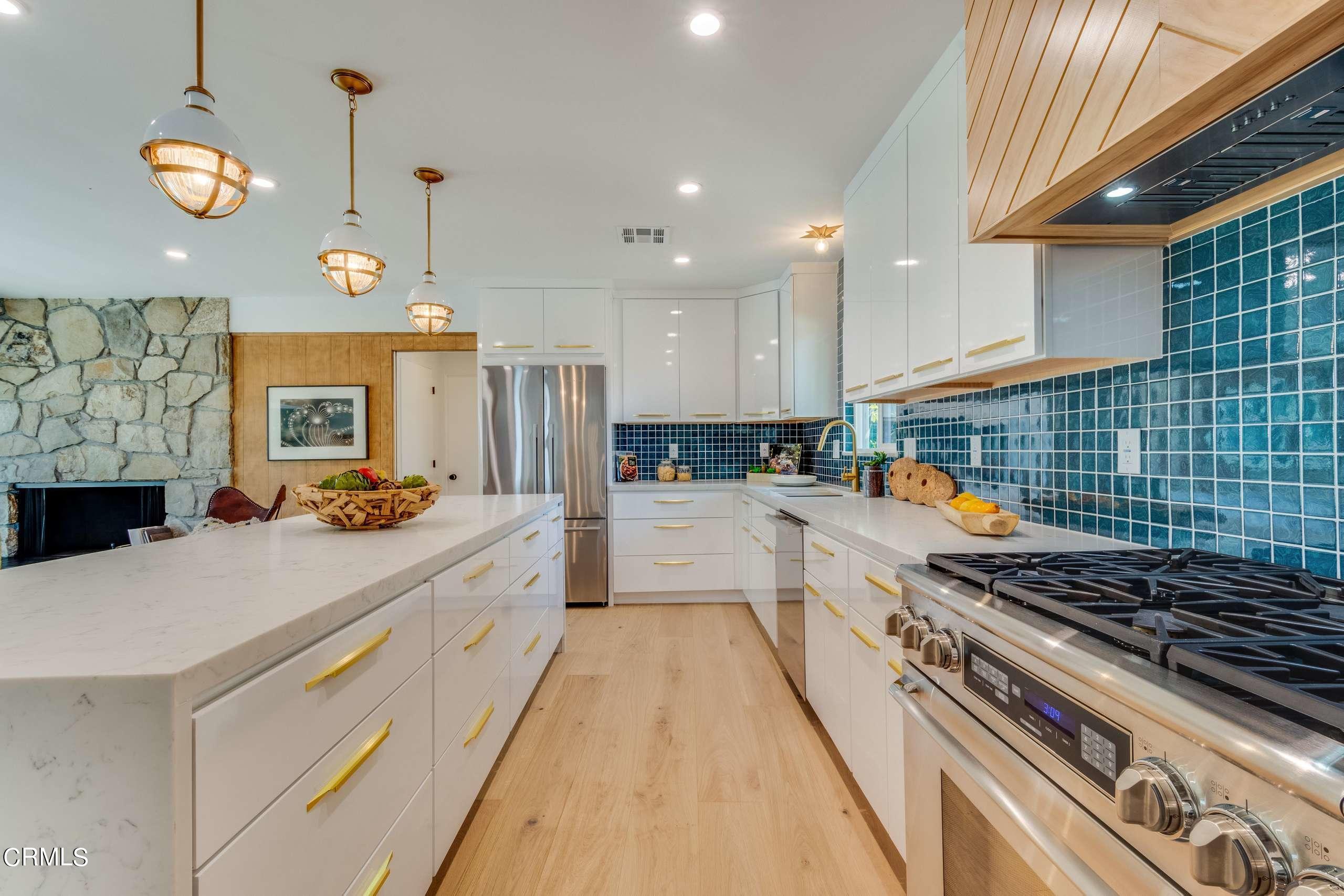 215 Highlawn Place Altadena, CA 91001 - Photo 14 of 38 a open kitchen with stainless steel appliances granite countertop a stove and a sink