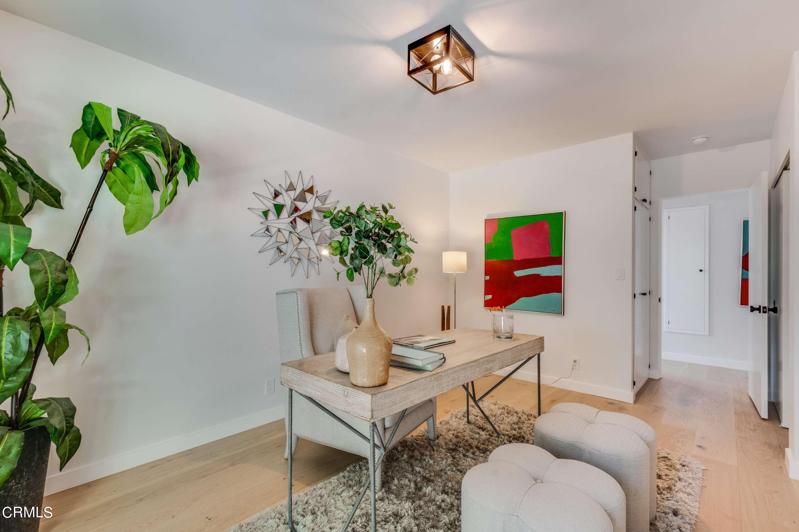 215 Highlawn Place Altadena, CA 91001 - Photo 21 of 38 a living room with furniture and a potted plant