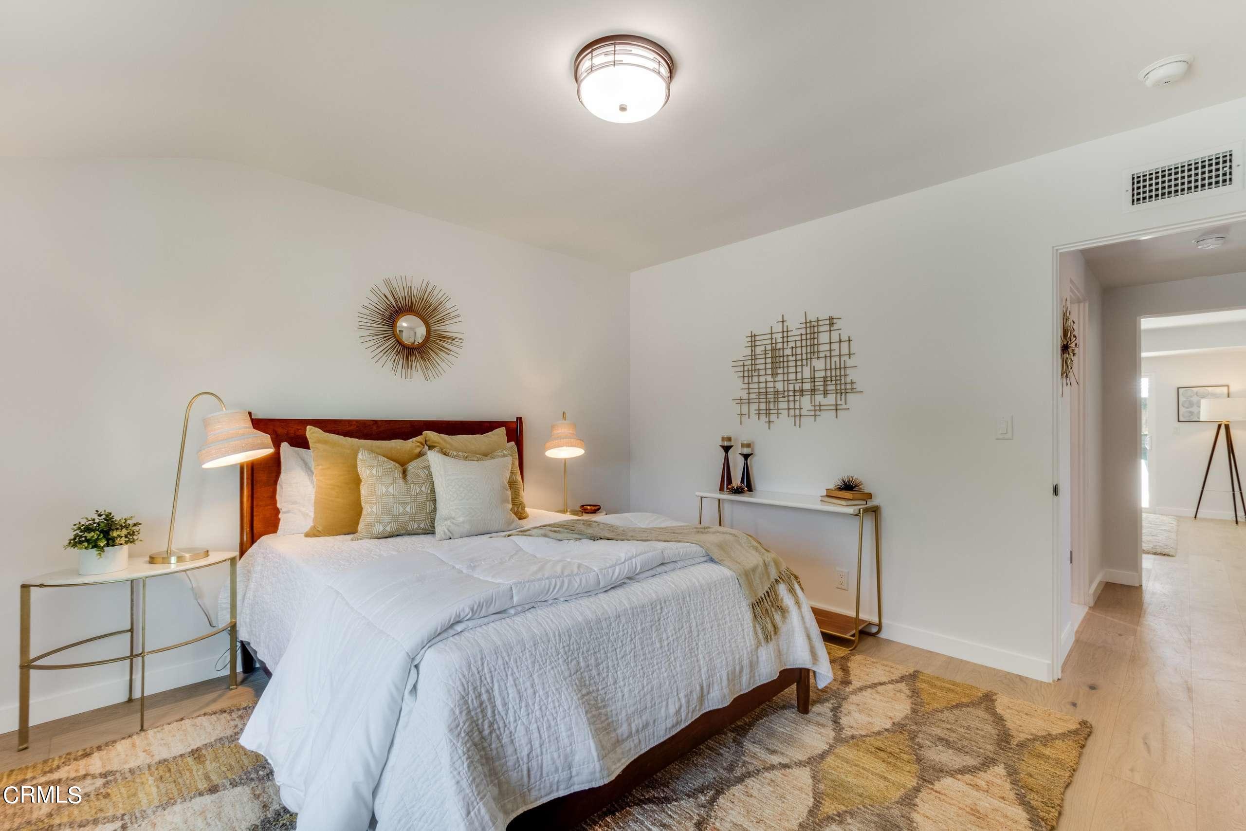 215 Highlawn Place Altadena, CA 91001 - Photo 24 of 38 a bed room with a bed and a table