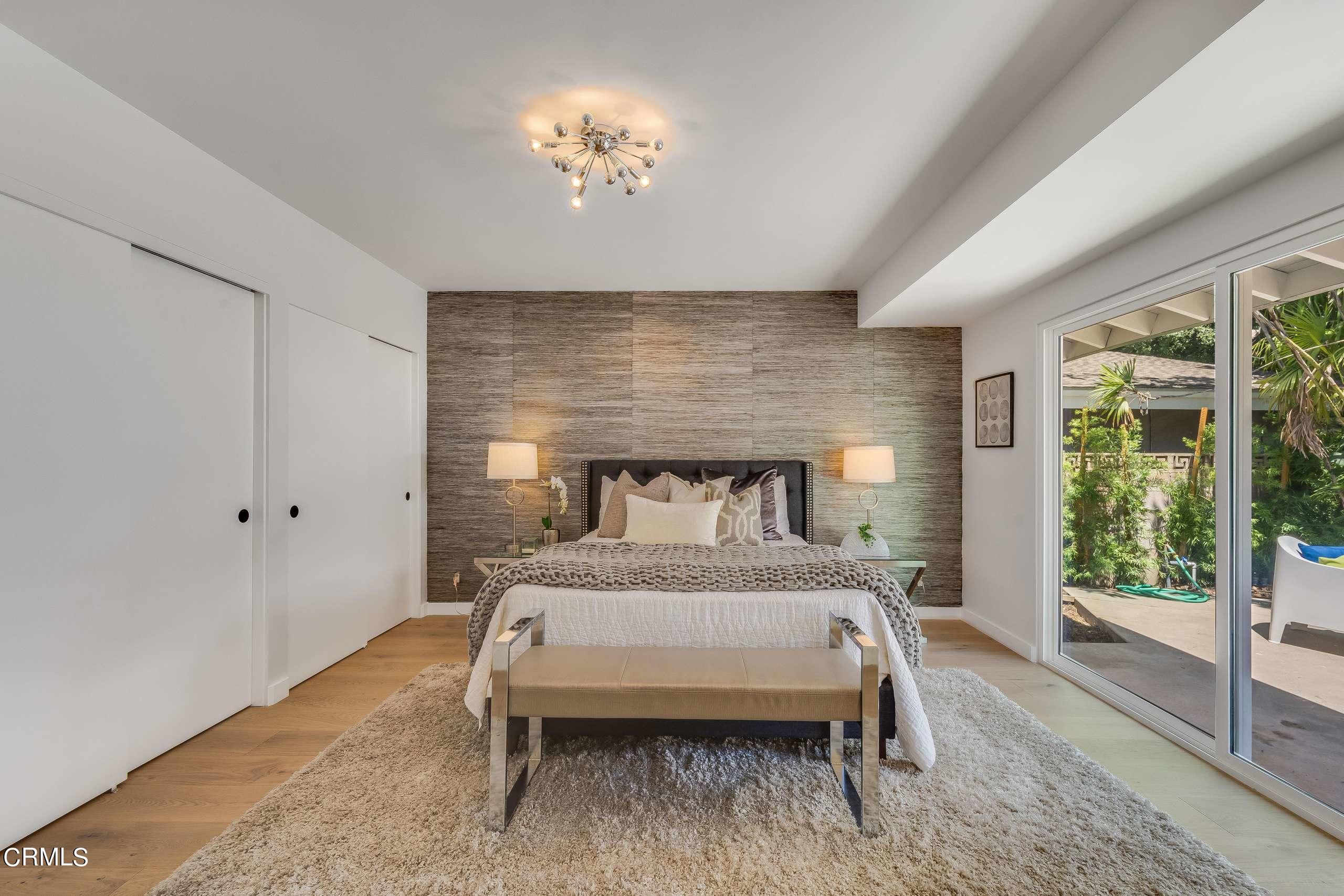 215 Highlawn Place Altadena, CA 91001 - Photo 29 of 38 a bedroom with a bed and a window